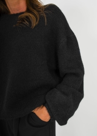 BLACK SWEATER WITH BOWS