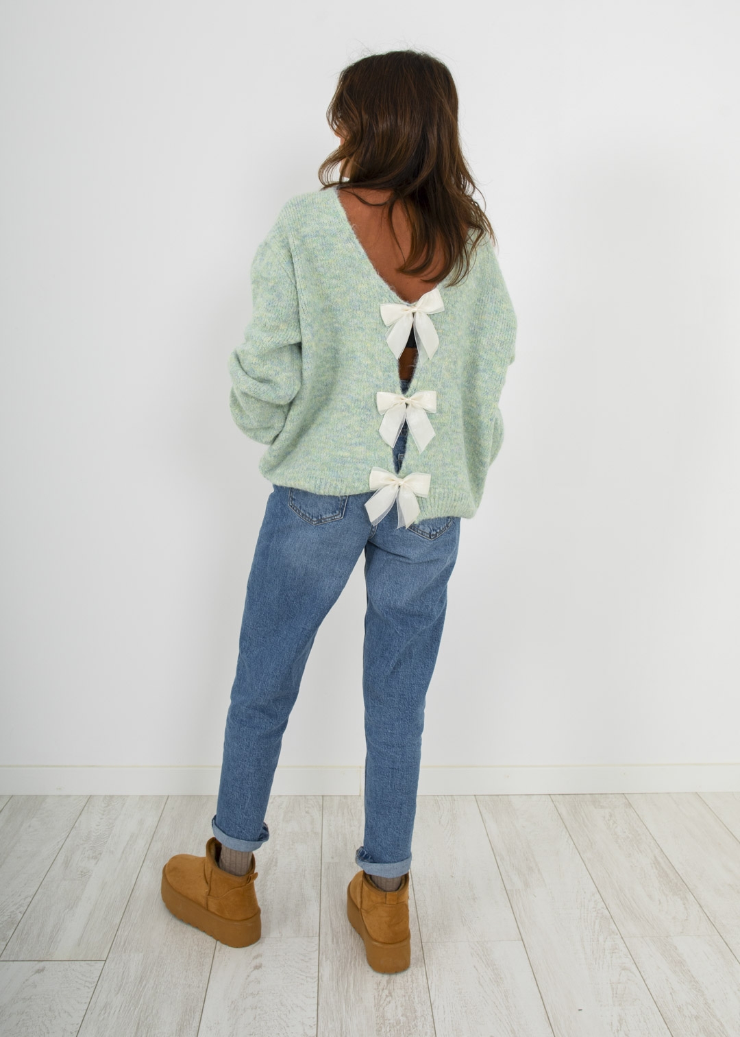 GREEN SWEATER WITH BOWS