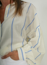 BEIGE SHIRT WITH BLUE STRIPES
